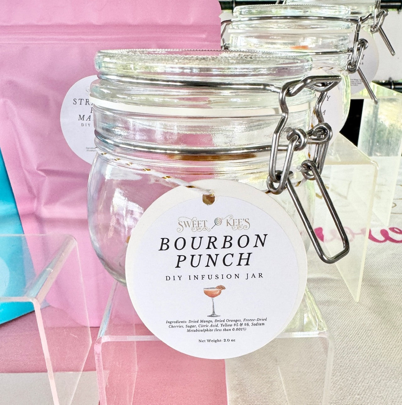 Glass jar with bourbon punch cocktail infusion ingredients. Just add bourbon or whiskey.