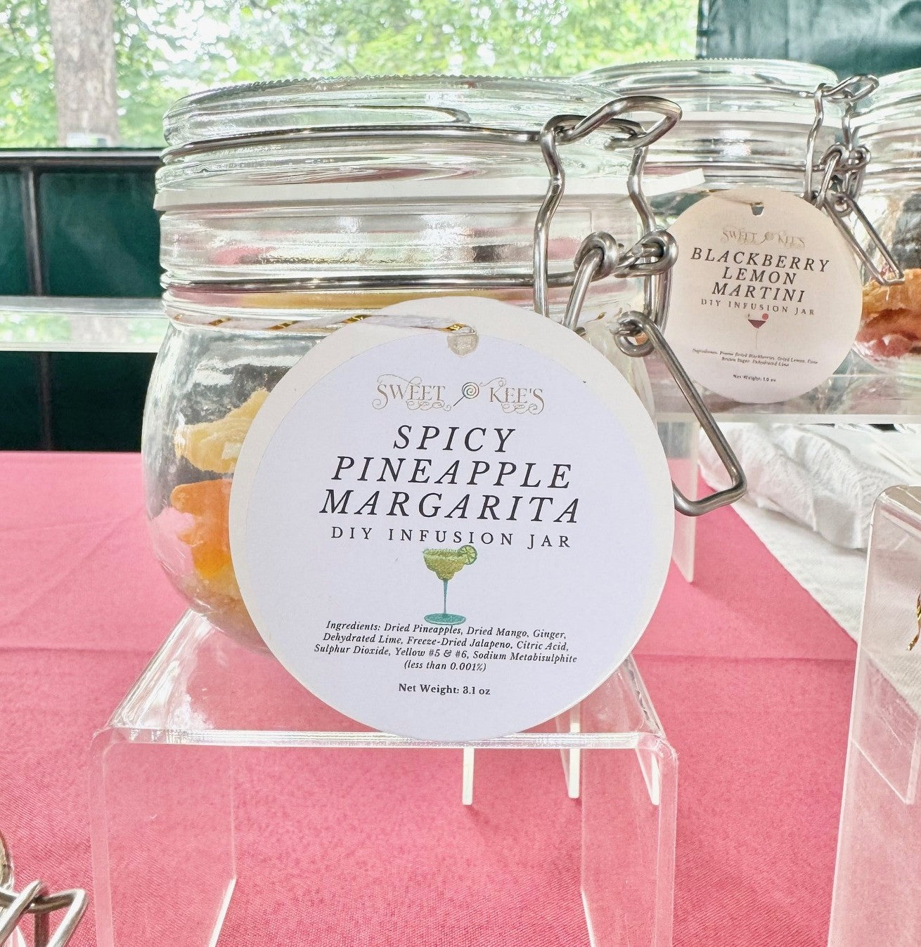 Glass jar with spicy pineapple margarita cocktail infusion ingredients. Just add tequila.