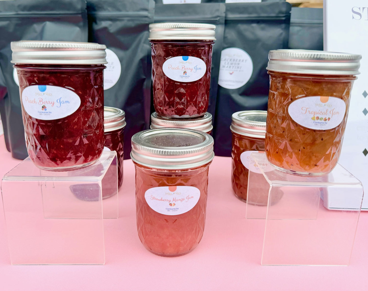 Sweet Kee's Small Batch Fruit Jams in Flavors like Peach Berry, Strawberry Mango, and Tropical.